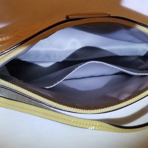 Coach Singature Stiched medium wristlet